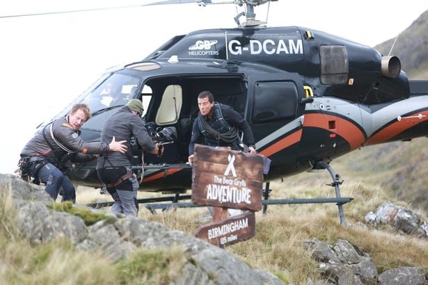 Bear Grylls lands in Birmingham on helicopter